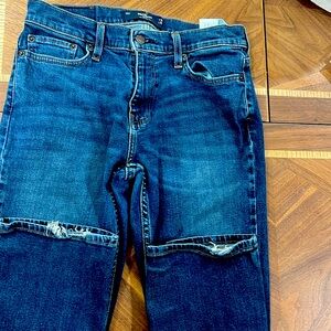 Men’s Hollister boot cut jeans .Has some fray at the ends . Smoke free home .